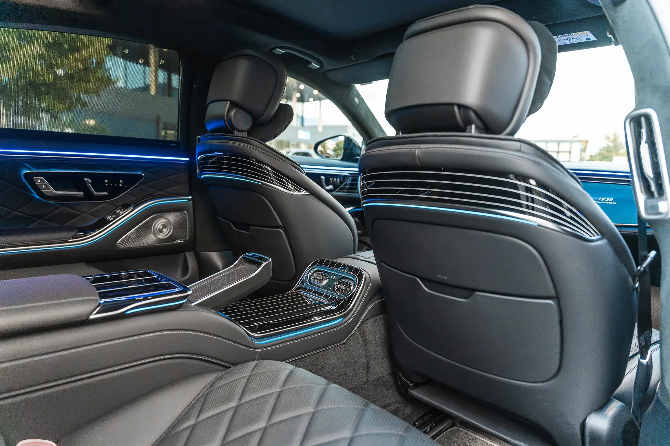 Rear cabin of the Mercedes S-Class with ambient lighting and quilted leather seats